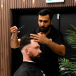 MEN ZONE master barber fading a beard line in Oshawa