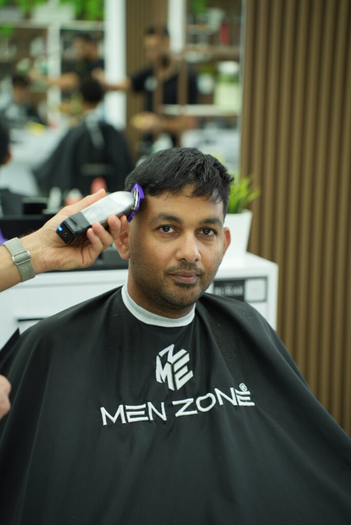 Crop hairstyle by barber in Hamilton